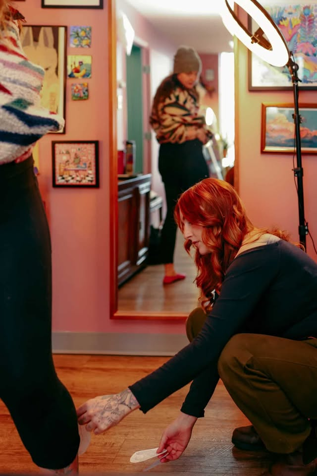 Artist preparing the tattoo station and supplies